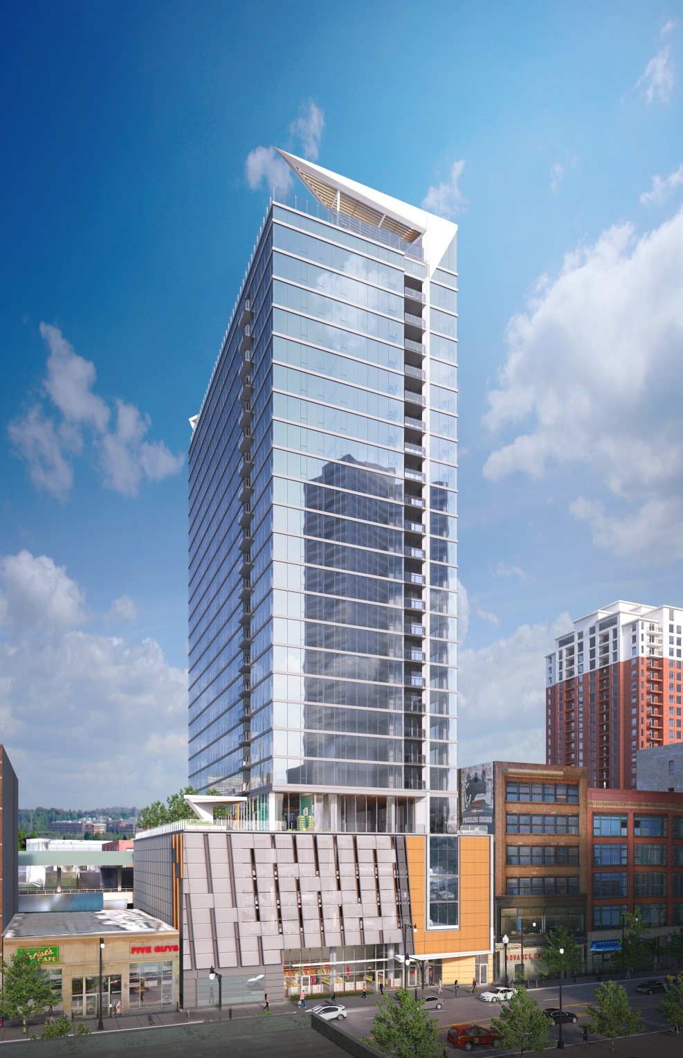 New 26-story multi-use pre-stressed concrete apartment tower with enclosed ramped parking on floor 1-4. Amenities include roof top swimming pool, health club and ground level retail and lobby.